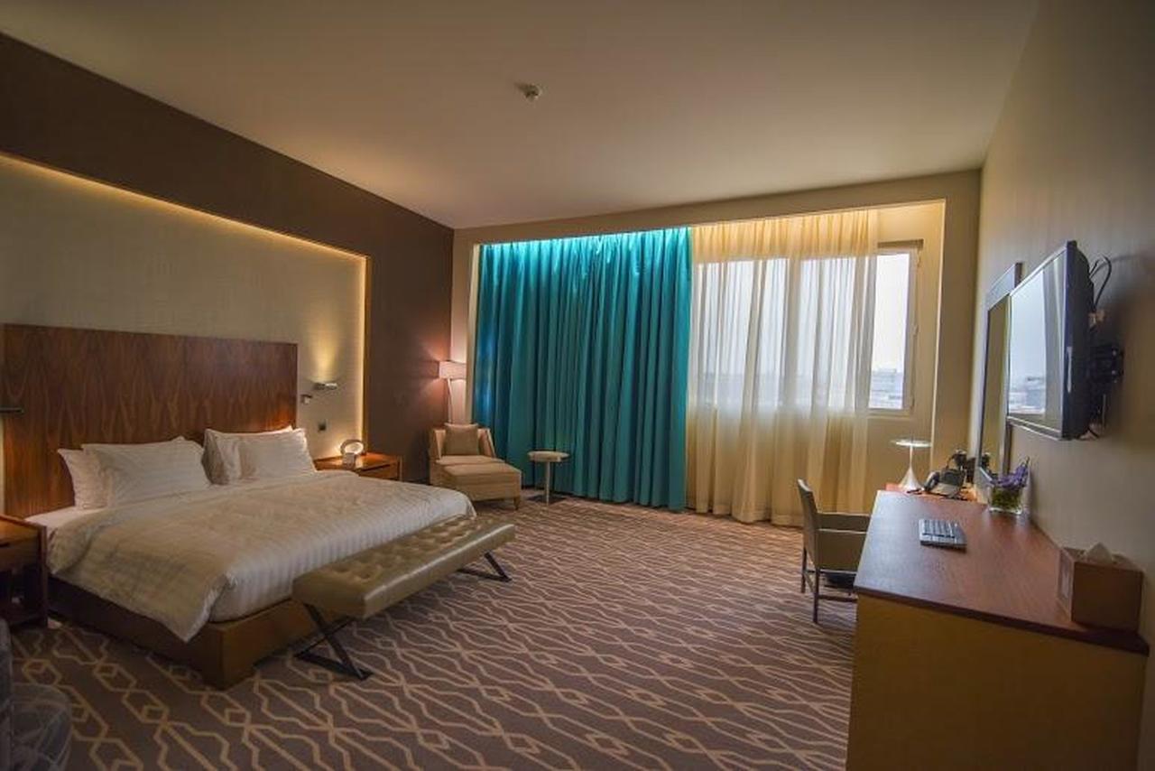 哈伊勒千禧国际酒店 外观 照片 A room at the hotel